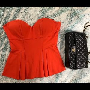 Beautiful strapless Bebe top.